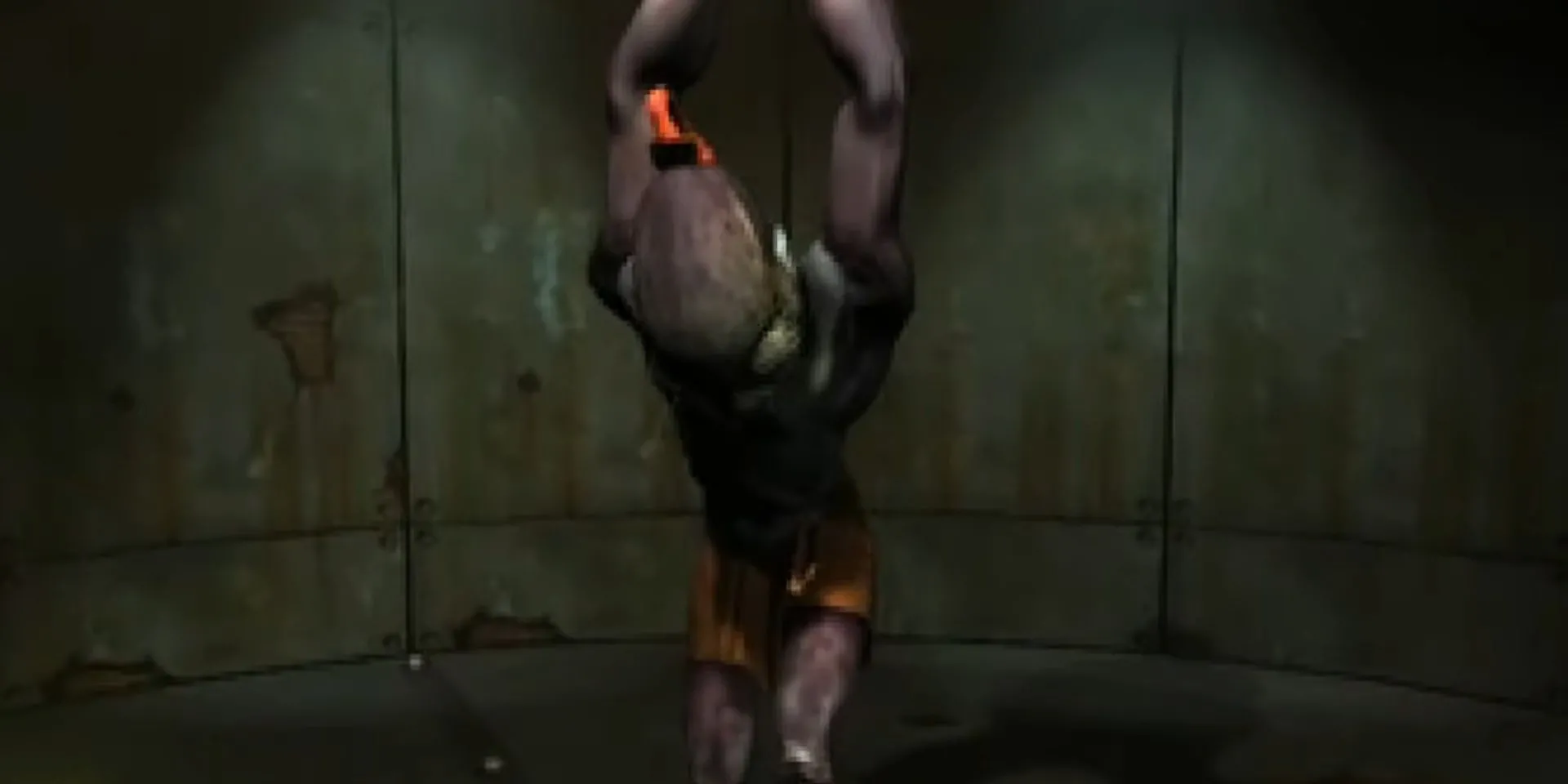 Abe bị xích trong một nhà giam kim loại ở Oddworld Abe's Oddysee