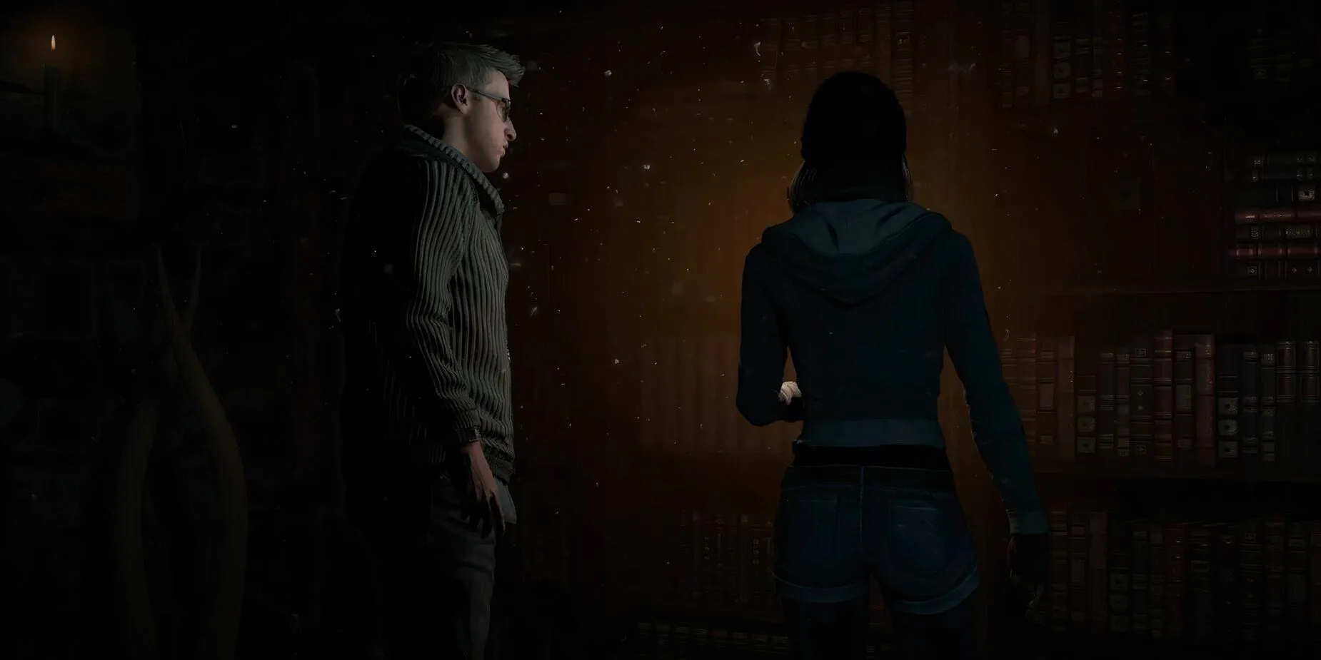 Các nhân vật trong Until Dawn đang tương tác gần tủ sách trong một cảnh game