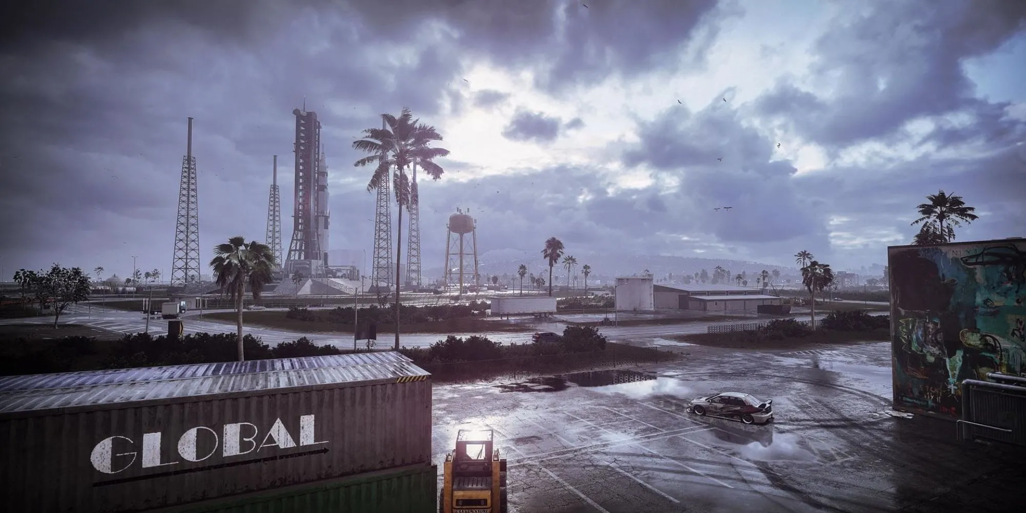 Cảnh đêm tại Palm City trong Need for Speed Heat với những chiếc xe đua và ánh đèn neon rực rỡ
