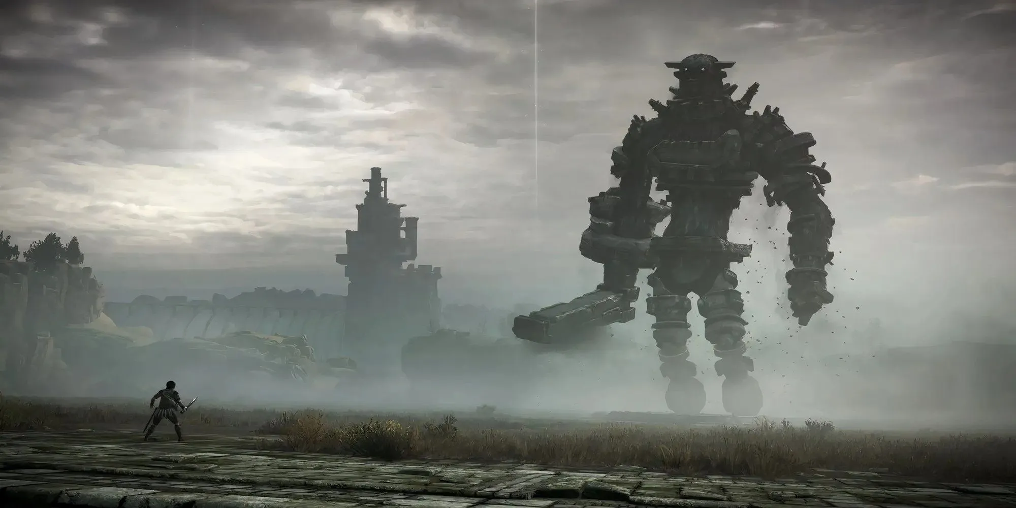 Nhân vật chính đối mặt với một Colossus hùng vĩ trong Shadow of the Colossus
