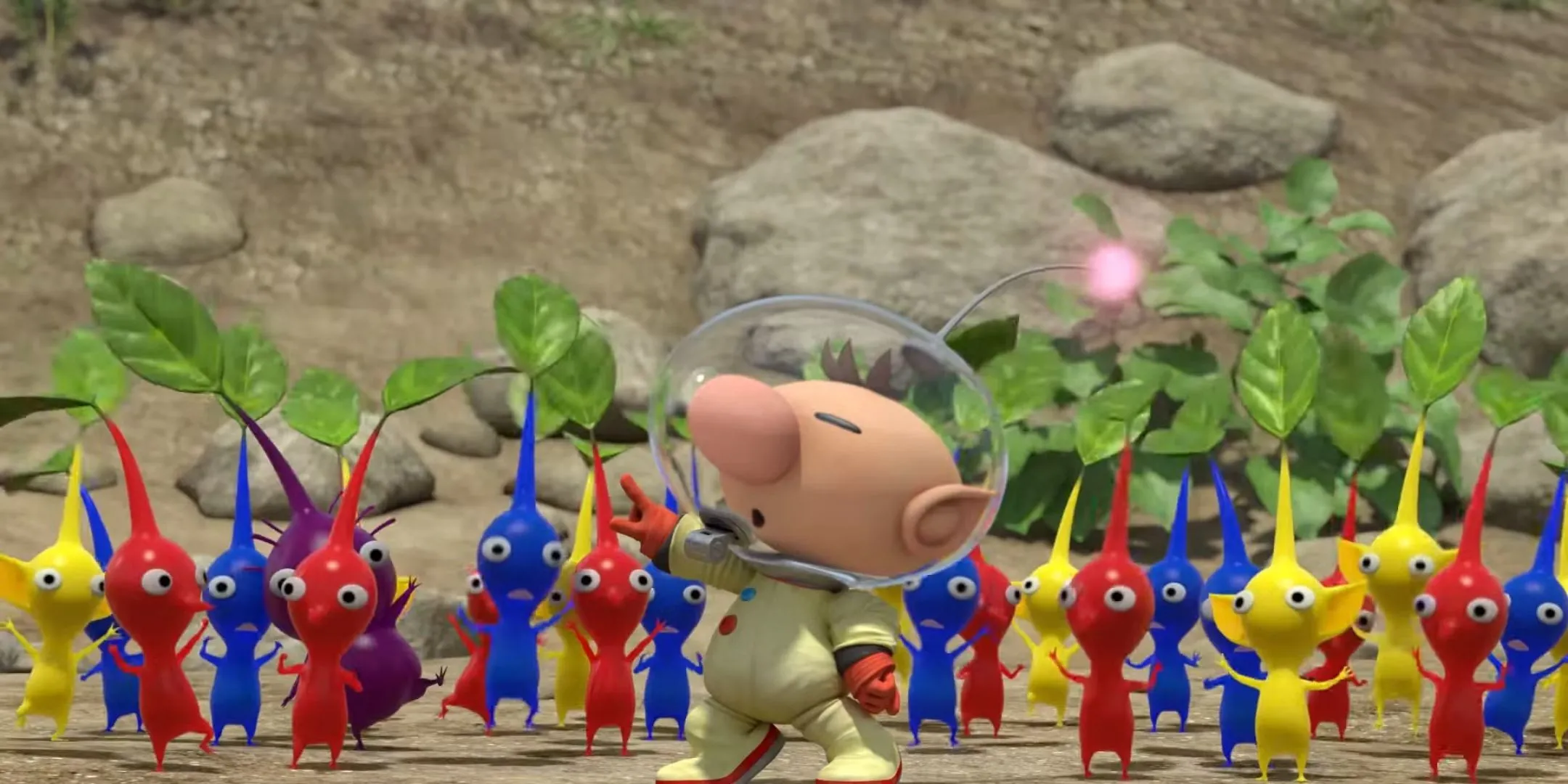Olimar đang chỉ huy một nhóm Pikmin đỏ, xanh dương, vàng và tím trong game Pikmin.