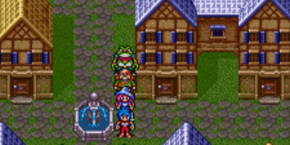 Các nhân vật game xếp hàng bên đài phun nước trong Breath of Fire 2, minh họa phong cách đồ họa và bối cảnh game nhập vai cổ điển