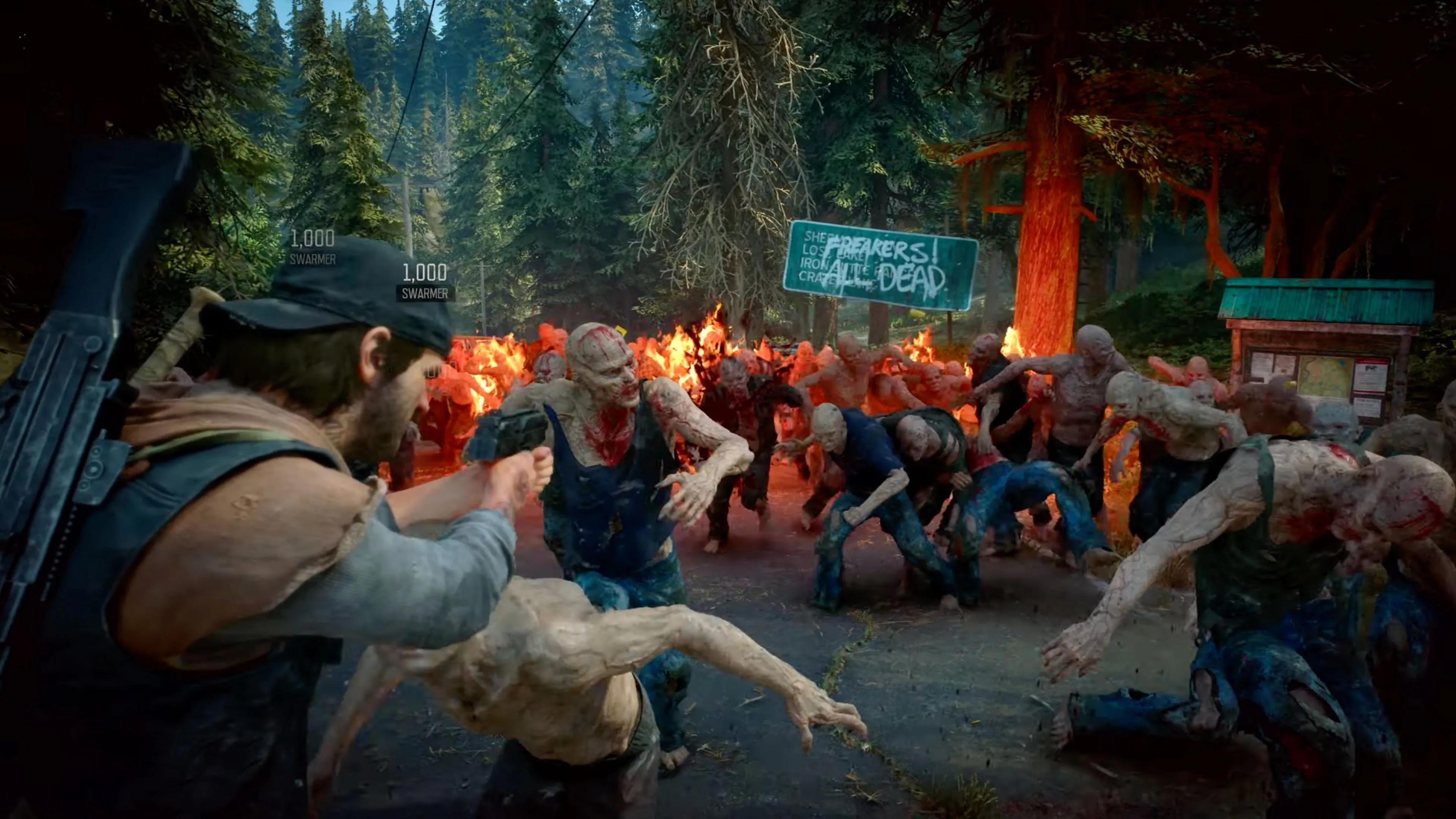 Cảnh chơi game Days Gone Remastered với Deacon đang đối mặt với Freakers