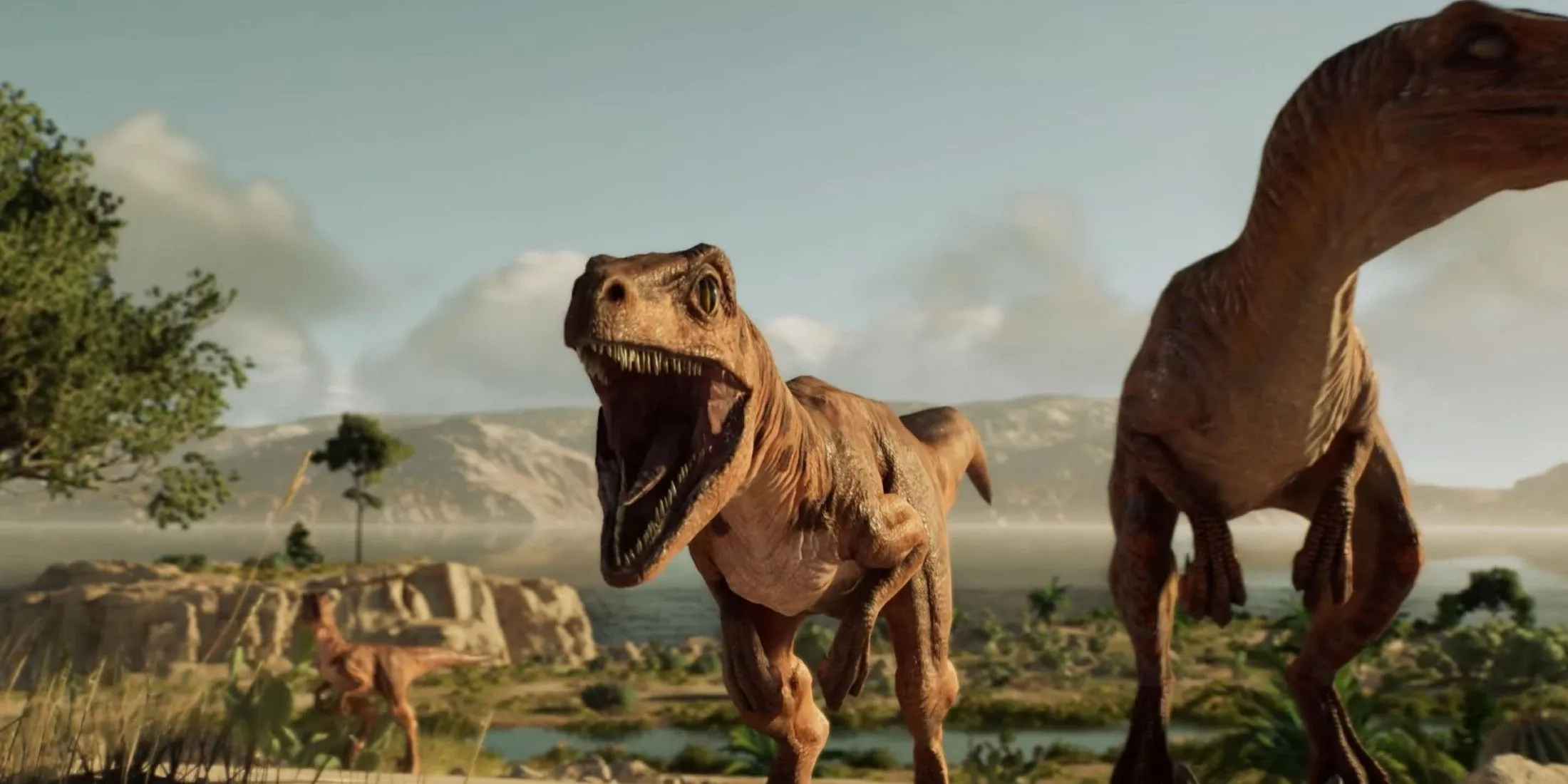 Hai chú Velociraptor đang săn mồi trong công viên Jurassic World Evolution 3